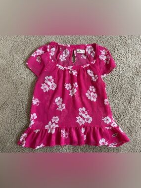 Hollister Bright Pink Floral Ruffle-Hem Top.